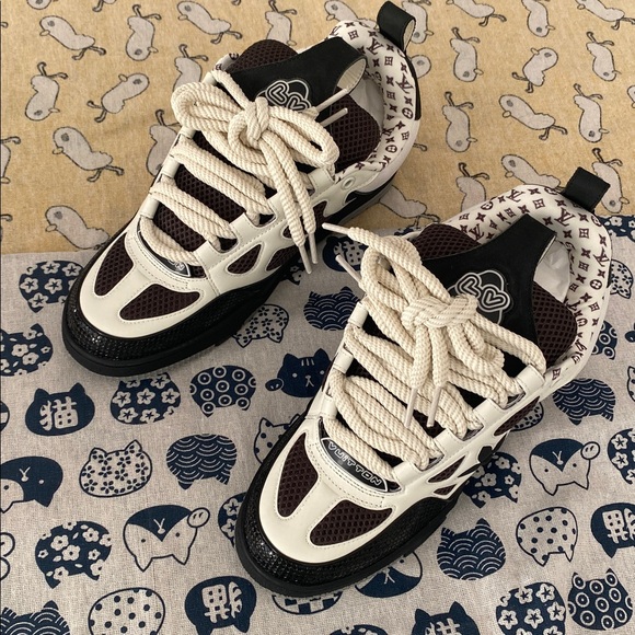 Louis Vuitton White And Black Sneakers - Picture 2 of 8